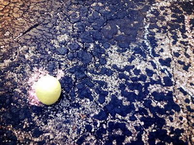 Chalk ball driveway asphalt old cracked stock photo