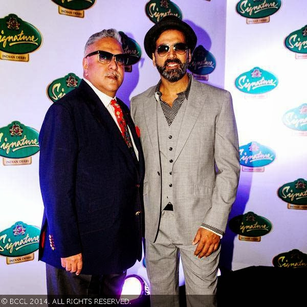 Akshay Kumar and Vijay Mallya pose for the cameras during The McDowell Signature Premier Indian Derby at Mahalaxmi Race Course in Mumbai, India on February 02, 2014. 