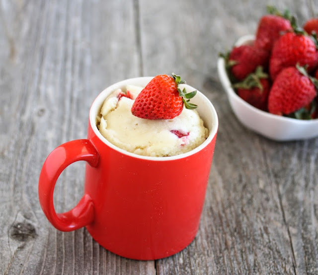 photo of strawberries and cream mug cake
