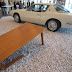 Dick Van Dyke's Studebaker with a camel table in front