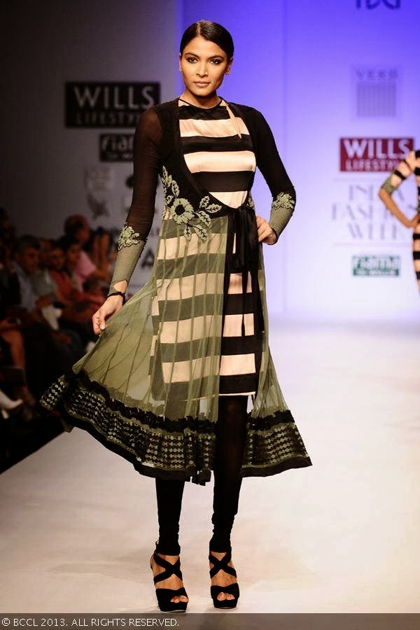Hemangi displays a creation by fashion designer Pallavi Singhee on Day 5 of Wills Lifestyle India Fashion Week (WIFW) Spring/Summer 2014, held in Delhi.