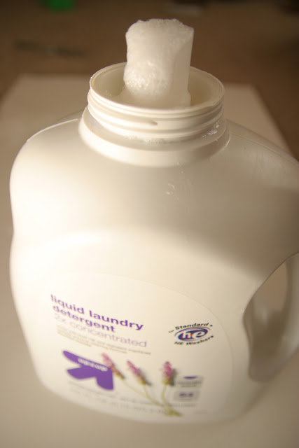 Make your own homemade liquid laundry detergent with just a few simple and natural ingredients!