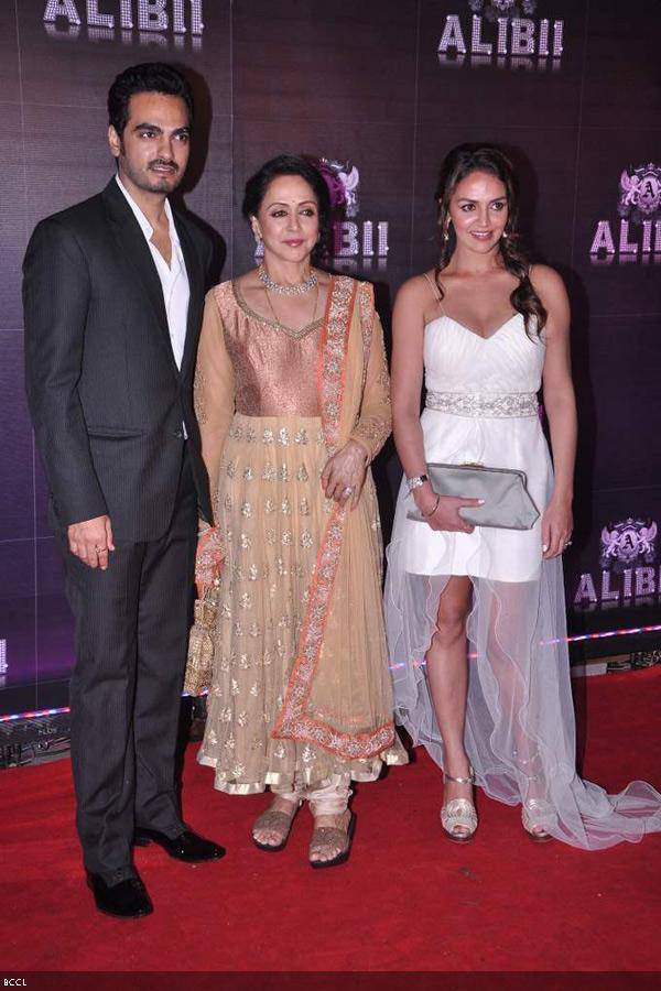 Veteran actress Hema Malini with Bharat Takhtani and Esha Deol pose for the shutterbugs during Bollywood actress Sridevi's birthday party, held in Mumbai, on August 17, 2013. (Pic: Viral Bhayani)