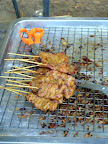 Moo Bing, or a grilled pork, pork skewers, Thai breakfast, Thai street food