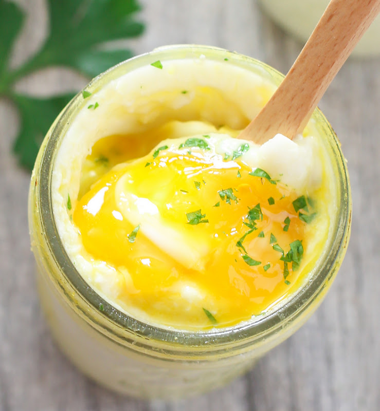 close-up overhead photo of coddled eggs with mashed potatoes in a jar