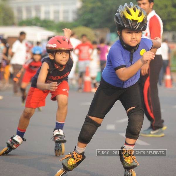 Children skating during the Raahgiri Day, held at Connaught Place.