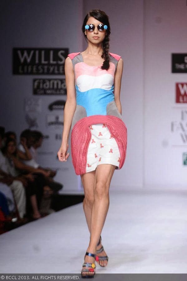 Sapna Kumar showcases a creation by fashion designer Shantanu Singh on Day 4 of Wills Lifestyle India Fashion Week (WIFW) Spring/Summer 2014, held in Delhi.
