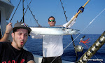 Adam Ludwig presenting Joseph Sweeney with his 30+ lb ONOcaught on the Sweney Party Offshore Adventure  October 7, 2011