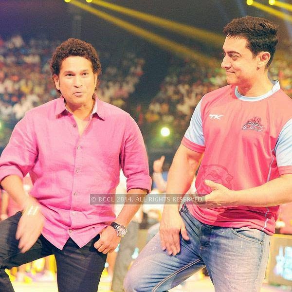 Sachin Tendulkar and Aamir Khan during the opening match of Pro-Kabbadi League, held in Mumbai, on July 26, 2014. (Pic: Viral Bhayani) <br /> 
