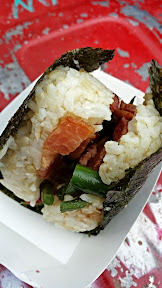 Pine Mountain + Deeproots bacon green bean onigiri at the Hollywood location of the Portland Farmers Market