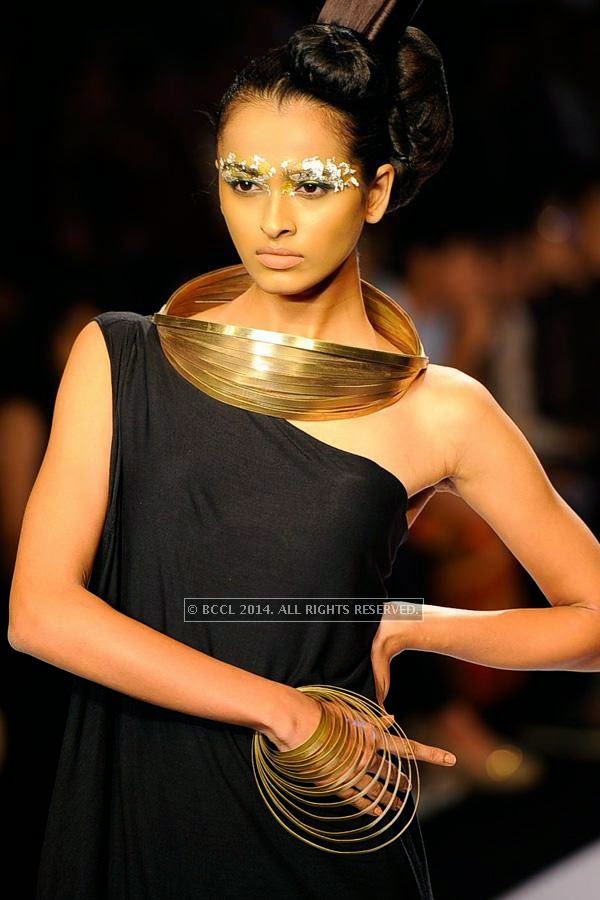 A model showcases a creation by NID on Day 3 of India International Jewellery Week (IIJW), 2014 at Grand Hyatt, Mumbai.