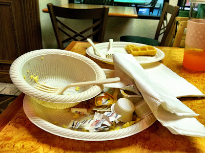 dirty dishes hotel breakfast wrappers photo