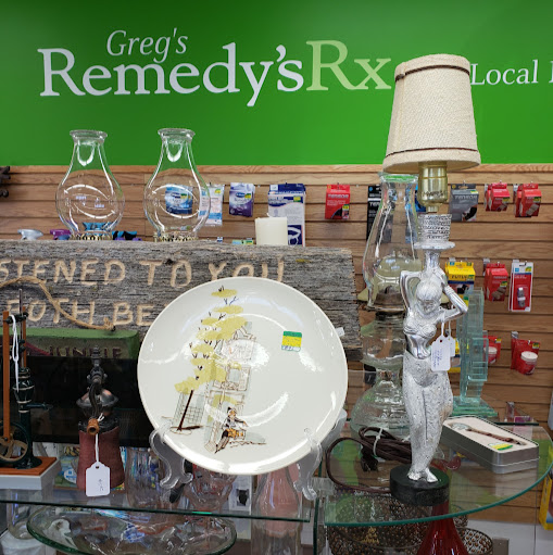 Greg's Remedy's Rx Drugstore logo