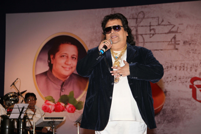 Bappi Lahiri seen in all his fineries at 'Chirantan Anil' musical concert, held in memory of late music director Anil Mohile, in Mumbai on February 3, 2013. (Pic: Viral Bhayani)