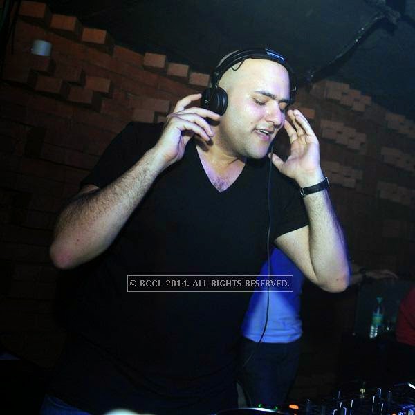 DJ Aly during a DJ party in the city.
