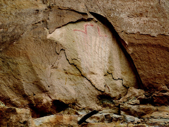 Pictograph above some granaries
