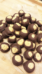 Buckeye Balls - peanut butter, vanilla, sugar, then dipped in chocolate