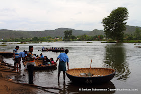 Coracles are the only way to cross the swirling Cauvery river