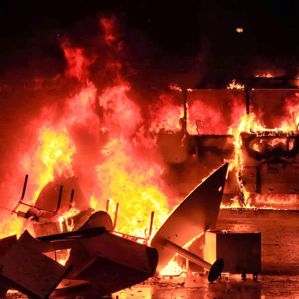 A bus burns after demonstrators from the group Black Bloc set fire to it during a protest in Rio de Janeiro.