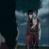 Mai and Zuko standing together, arm in arm. Azula in the foreground, facing them.