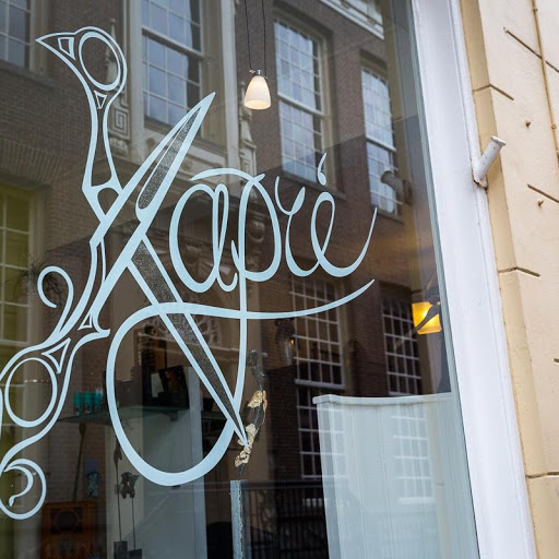 Kapré, Kapper André logo