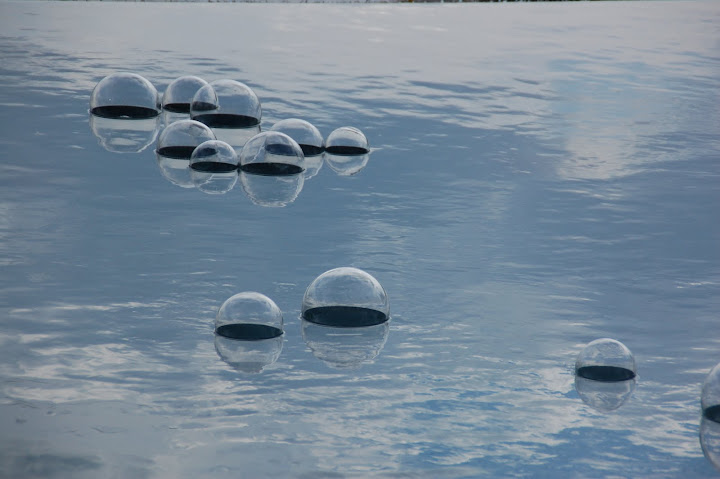 Glass bubbles floating in pool