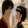 Mai's hand on Zuko's cheek; Zuko smiling awkwardly