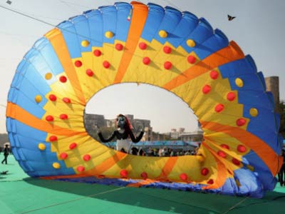 Kites in different shapes and colours dotted Ahmedabad skies to the delight of viewers.