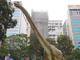 large dinosaur outside the Hong Kong Science Museum