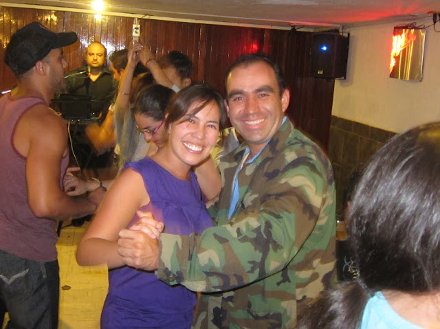 Kim busting a move with her cousin Arturo at an old school cantina