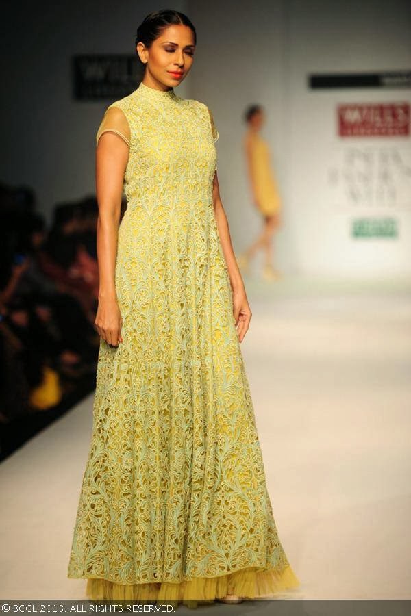 Candice walks the ramp for fashion designer Manish Gupta on Day 2 of the Wills Lifestyle India Fashion Week (WIFW) Spring/Summer 2014, held in Delhi.