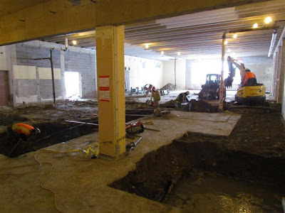 Trenches and footing holes in cafeteria Trenches and footing holes in cafeteria