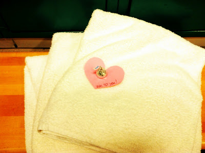 hershey kiss white towels locker room bench wood stock photo