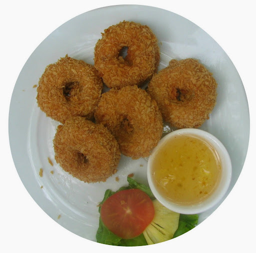 shrimp puffs in coconut, served with sweet and sour sauce. From A Complete Guide to Feeding Kids in Thailand