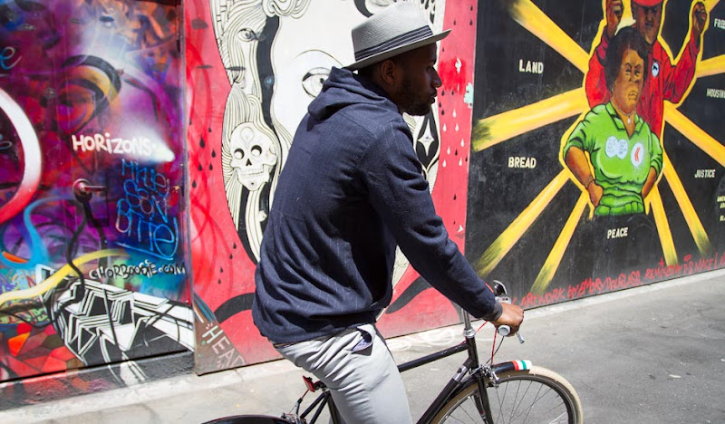 Navy Exec Hoodie Riding Bike in Mission