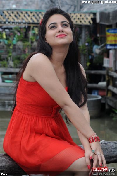 Indian actress Aksha looks hot in a red dress as she poses during a photoshoot.www.galleryrub.com <br /> 