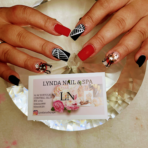 Lynda nails salon And Spa and tattoo full body piercing logo
