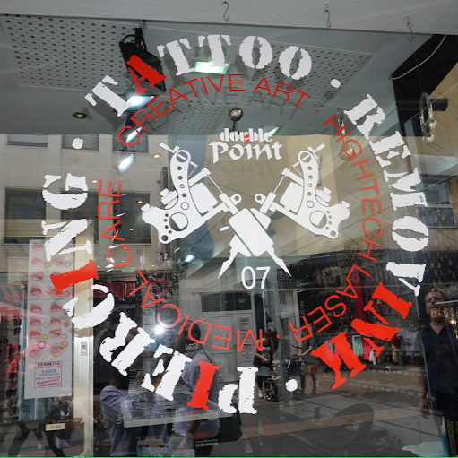 Doublepoint-Tattoo/Piercing Shop logo