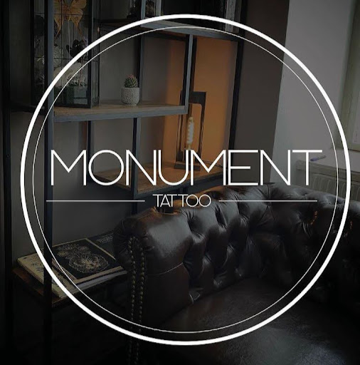 Monument Tattoo logo