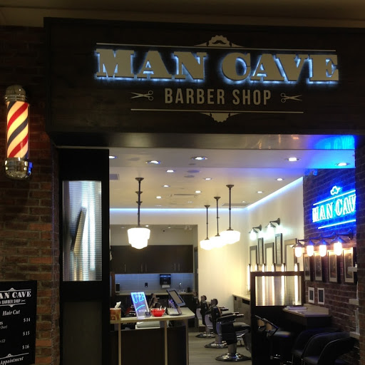 Man Cave Barber Shop logo
