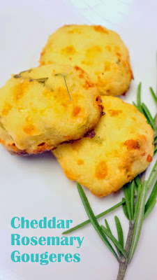 Cheddar Rosemary Gougeres dough, after forming it into the balls about 1 inch in order to make these cheesy puffs bite size to eat between sips of champagne or sparkling wine!