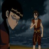 Zuko looks at Mai, pointing at himself angrily. Mai looks away from him