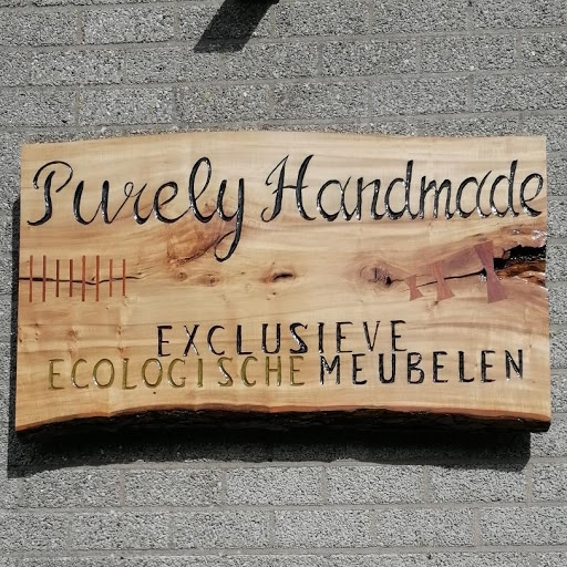 Purely Handmade logo