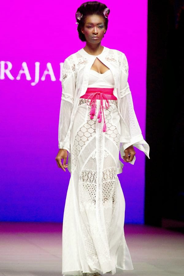 A model presents a creation by South African fashion designer Gavin Rajah on July 24, 2014 during the fashion week at the Cape Town International Convention Centre, in Cape Town, South Africa.