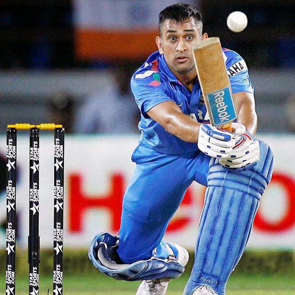 Indian captain M.S.Dhoni plays a shot against Australia during their T20 match in Rajkot.