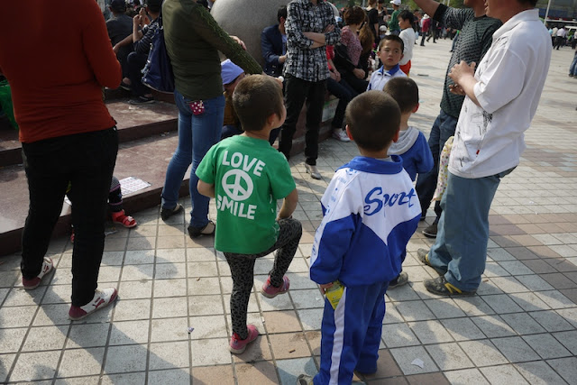 two boys at Nanmen Square in Yinchuan, Ningxia, China