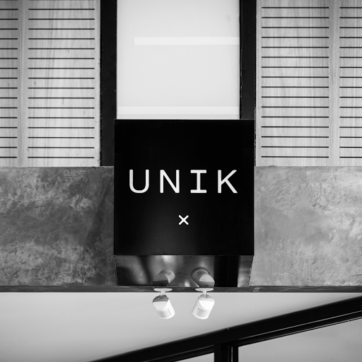 UNIK Hair Design logo