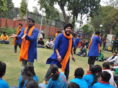 Participants in action during a street play competition at FMS, Delhi.