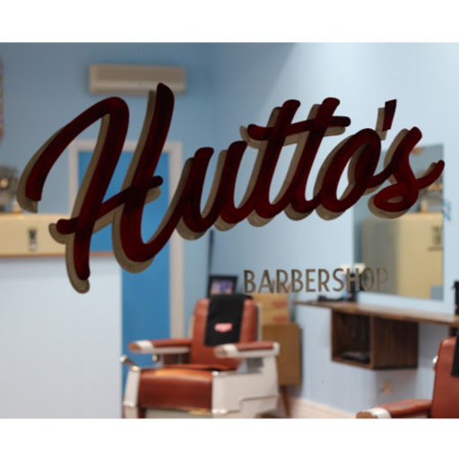 Hutto's Barber Shop logo