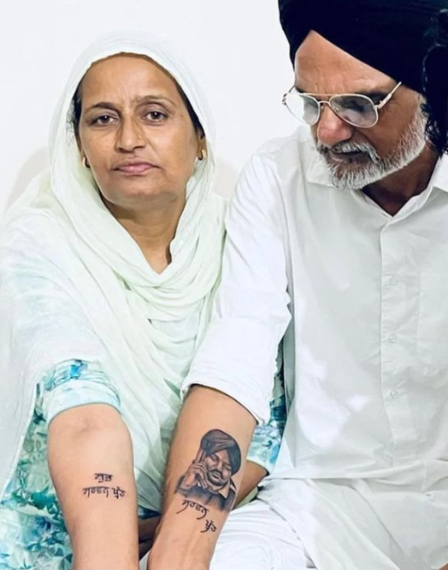 Sidhu Moosewala's parents get tattooed 